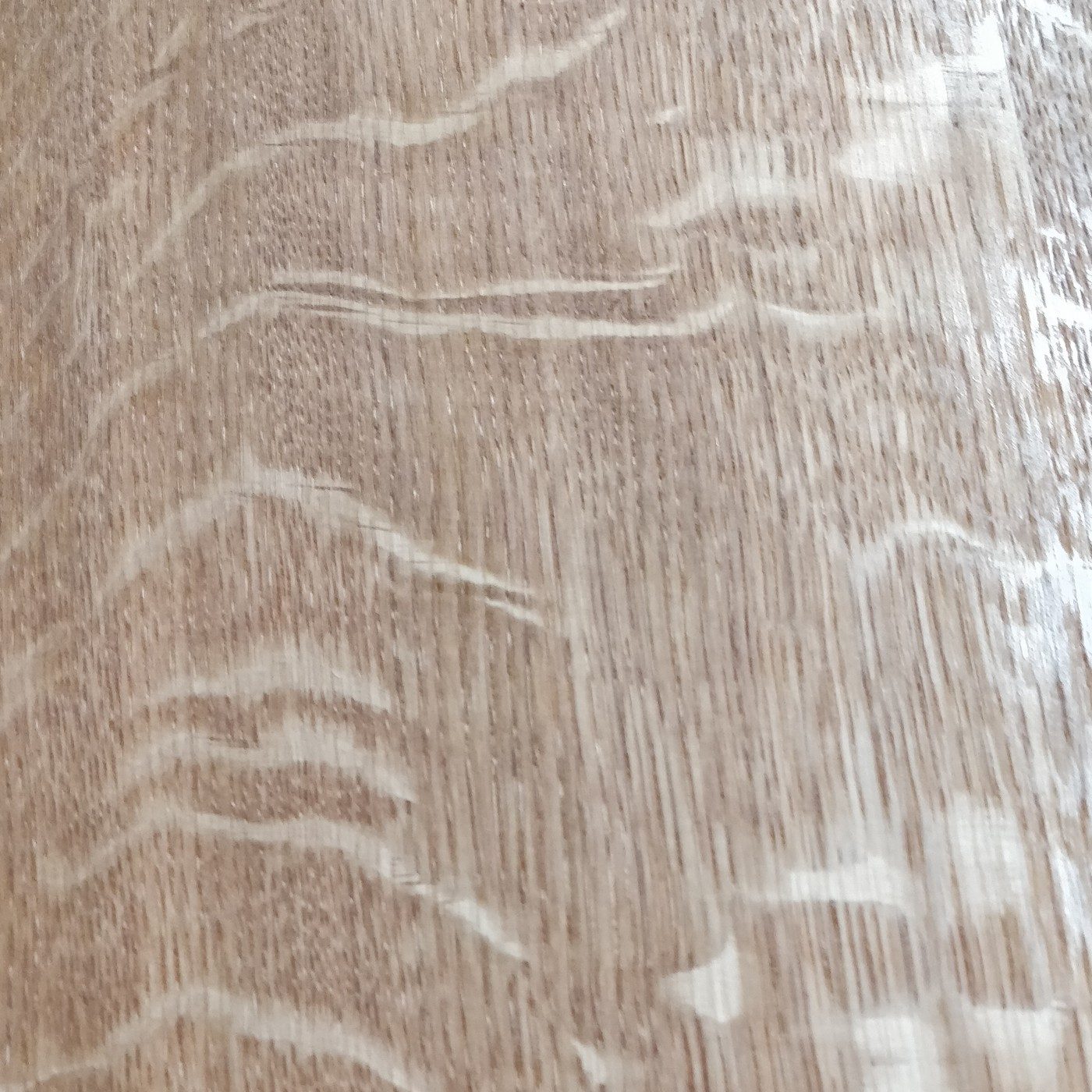 Quarter sawn oak: straight stripes with light ray flecks across the grain